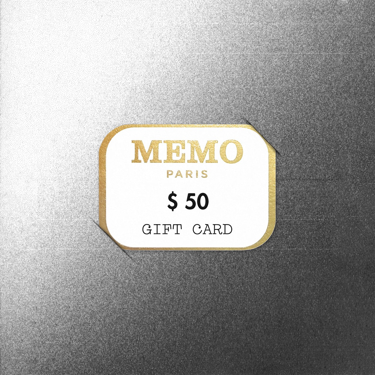 A white and gold memo paris gift card with a fifty dollar value and elegant typography for fragrant treasures