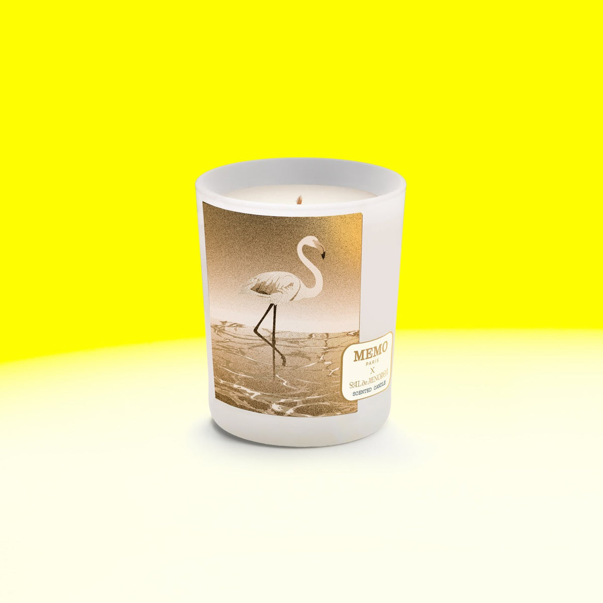 White frosted glass candle jar with gold foil flamingo and memo paris label in sal de menorca design